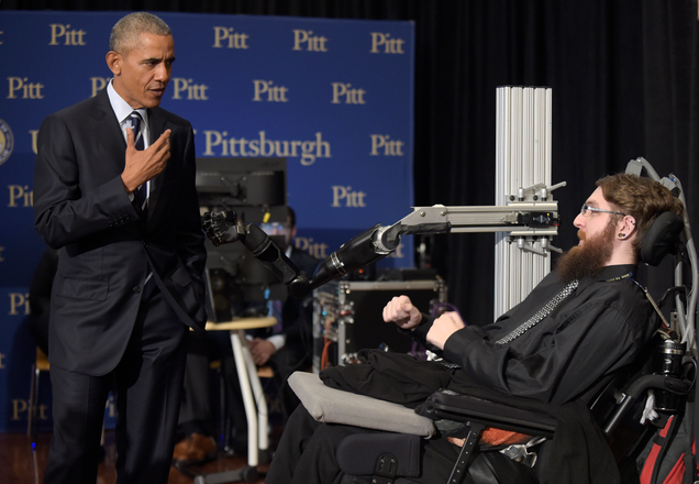 President Barack Obama with Nathan Copeland, who can feel despite paralysis. IMAGE: AP Images